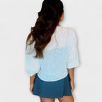 Olivia - Blusa con parte delantera abierta